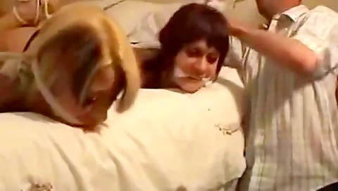 Two Girls Hogtied Gagged And Kissing